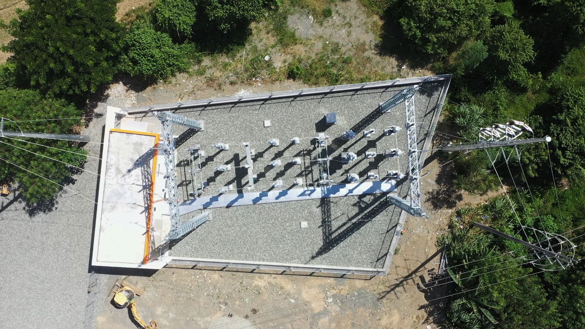 A JC Electrofields substation under construction — steel structures and switchgear across the yard